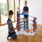 Hot Wheels Track Set with 4 1:64 Scale Toy Cars, Super Ultimate Garage, Over 3-Feet Tall