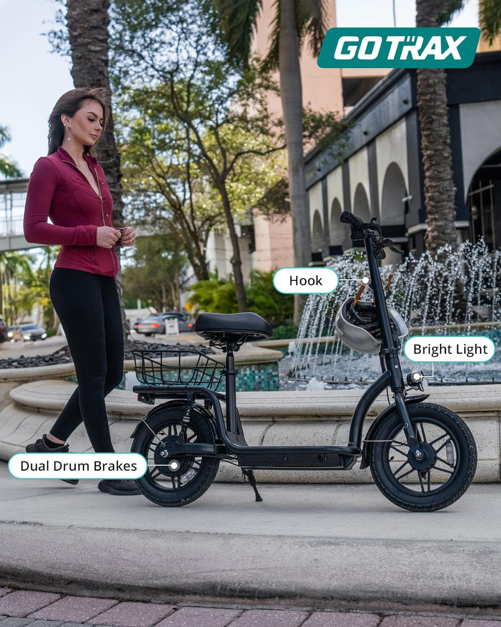 Gotrax adult electric scooter with seat, maximum range of 19-25 miles, all-terrain tires, wide pedals, padded seat, and carrycot