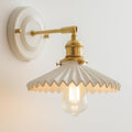 Modern Brass Wall Lamp with Adjustable Arm and Pleated Ceramic Shade