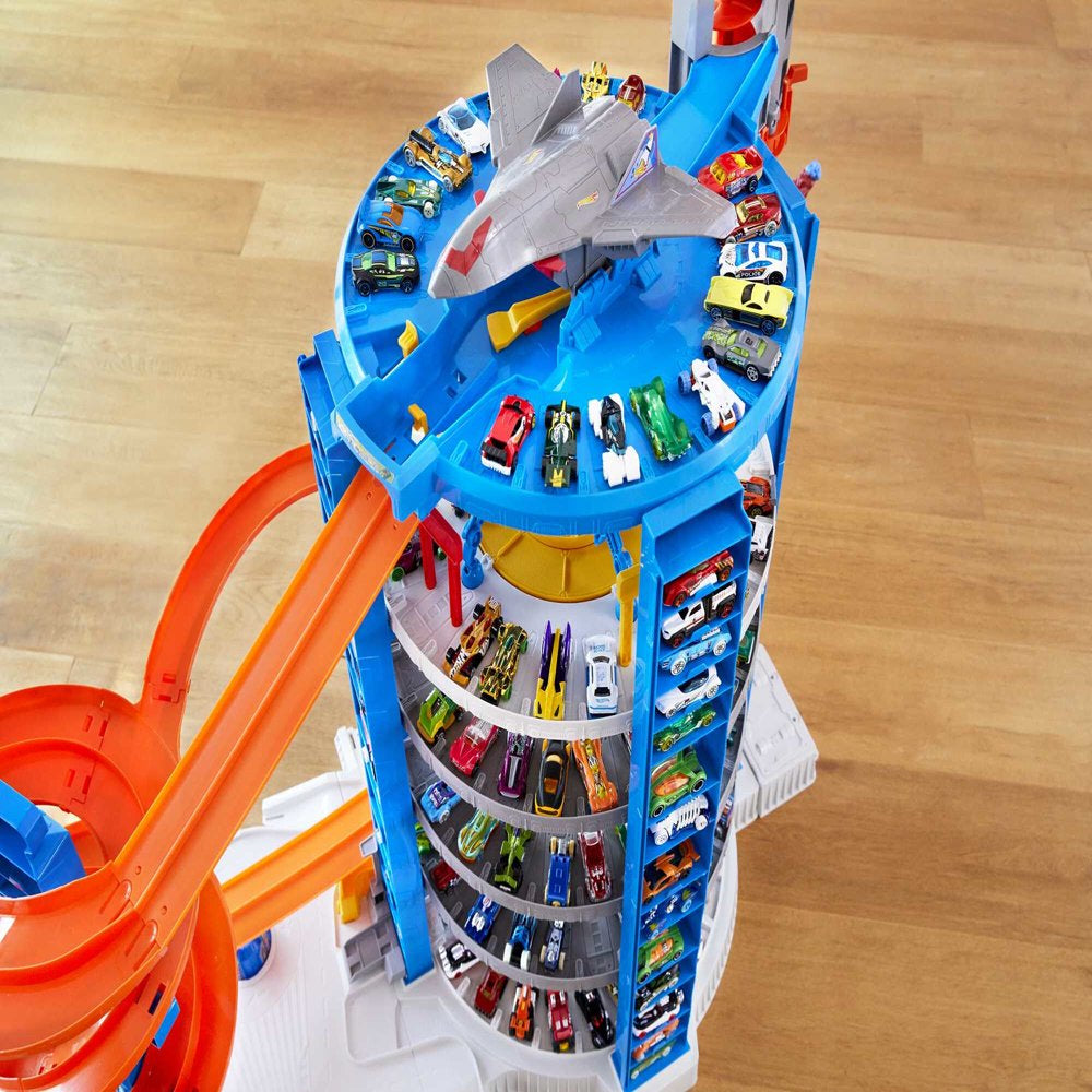 Hot Wheels Track Set with 4 1:64 Scale Toy Cars, Super Ultimate Garage, Over 3-Feet Tall