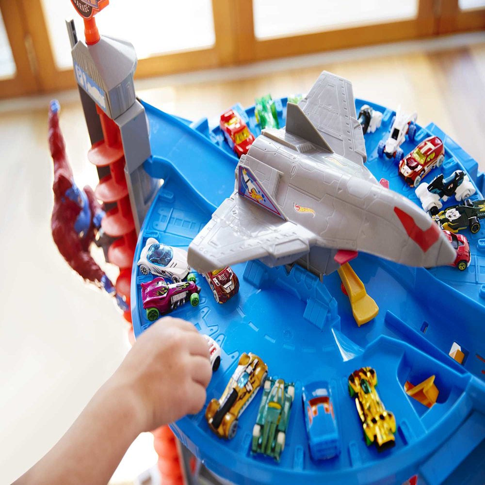 Hot Wheels Track Set with 4 1:64 Scale Toy Cars, Super Ultimate Garage, Over 3-Feet Tall